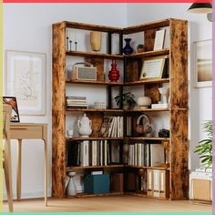 an open bookcase with many books on it in a room next to a table