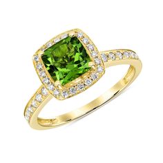 This incandescent, fit-for-a-queen beauty is 18K gold, with majestic diamonds, enveloping a grand peridot, to make you look and feel as though you’ve stepped into a grand fairy tale all your own. Scroll down to our Gem Guide to learn more about Peridot. Measurement: 9.2 x 9.2 x 8 mm Weight: 3.48 grams, 18k gold Please allow 4-6 weeks for production. Formal Green Halo Diamond Ring, Formal Diamond Ring With Halo For May Birthstone, Elegant Green Rings With Halo Design, Elegant Green Diamond Ring With Halo Design, Dazzling Green Diamond Ring For Formal Occasions, Formal May Birthstone Diamond Ring With Halo Design, Green Diamond Halo Ring In Round Cut, Green Luxury Halo Diamond Ring, Green Halo Ring With Round Cut For Formal Occasions