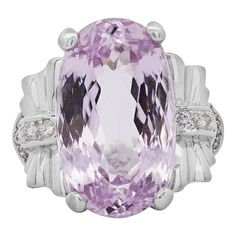 20.96-carat oval-cut light pink kunzite, surrounded by 0.28 carats total weight of round-cut halo diamonds, set in a delicate platinum filigree design for a refined and timeless look.  Details:  Item Type: Statement Ring Metal: Platinum 900 Size: 7 Weight: 13.15 Grams   Center Gemstone Details: Type: Kunzite Carat: 20.96 Carat Color: Light Pink Cut: Oval Cut   Side Stones Details:  Type: Diamonds Cut: Round Carat: 0.28 CTTW  A stunning 20.96-carat oval Kunzite gemstone as its centerpiece, with a Luxury Diamond Filigree Ring With Gemstone, Boho Chic Engagement Ring, Purple Engagement Rings, Red Engagement Ring, Art Nouveau Engagement Ring, Kunzite Ring, Citrine Ring Engagement, Garnet Engagement Ring, Pink Kunzite