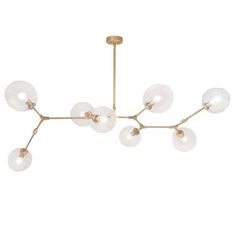 the brass chandelier with glass balls hanging from it's center, against a white background