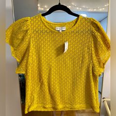 Brand New, Never Been Worn. Mustard Color Blouse With Flutter Sleeves In Large. Measures 20” Pit To Pit, 22.5” In Length. Chic Mustard Short Sleeve Top, Mustard Short Sleeve Top For Day Out, Chic Yellow Short Sleeve Tops, Spring Mustard Crew Neck Top, Mustard Crew Neck Top For Spring, Mustard Short Sleeve Blouse For Spring, Mustard Short Sleeve Blouse For Summer, Yellow Short Sleeve Blouse For Day Out, Yellow Crew Neck Blouse For Spring