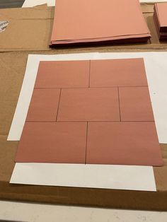 the paper is laid out and ready to be cut into pieces for making a wall decoration