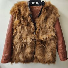 Perfect For Winter. Back: Genuine Leather And Shearling. Front: 100%Polyester Padded With Genuine Fox Fur Fully Covered. Leather Trimmed. Can Be Dressed Up Or Dressed Down. Button Closure. Please Be Careful When Using Bottons. 20" Across Bust Length:26“ Cognac Leather Winter Outerwear, Cognac Leather Outerwear For Winter, Brown Leather Fur Coat For Fall, Brown Leather Fur Coat With Faux Fur Lining, Luxury Brown Leather Fur Coat, Brown Leather Fur Coat With Faux Fur Trim, Luxury Brown Leather Jacket With Faux Fur Lining, Luxury Brown Leather Jacket With Faux Fur Trim, Shearling Coat