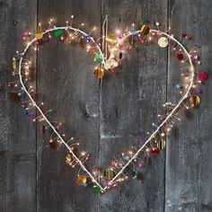 a heart shaped decoration with lights on it