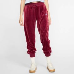 Nike Women's Sportswear Velour Heritage Jogger Pants In Red Size X-Large Polyester/Spandex/Velour Red Athleisure Sweatpants For Loungewear, Sporty Red Full-length Sweatpants, Red Winter Joggers, Red Athleisure Sweatpants For Sports, Sporty Red Loungewear Bottoms, Red Sports Joggers With Elastic Waistband, Sporty Red Pants For Jogging, Sporty Red Jogging Pants, Red Sporty Jogging Pants