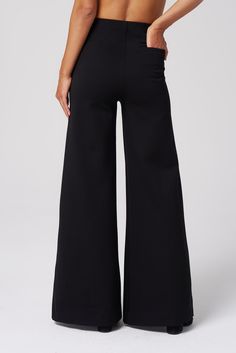 This ultra-wide pant is a statement maker in four-way stretch ponte. Style it with a tucked-in tee for a casual look or dress it up with a blazer for a power suit. ✓ Wrinkle Free ✓ Four-Way Stretch ✓ Day to Night ✓ Pocket DETAILS Luxe ponte knit Elasticated pull-on waistband No-Bulk back pocket FIT Wide leg Regular waist fit True to size Model is 5'8" and wears size S MEASUREMENTS Inseam: 32.5" Front rise: 11.5" (size S) Leg opening circumference: 29" (size S) FABRIC + CARE 67% rayon, 30% nylon, Makeup Wishlist, Kimono Sweater, Versatile Pants, Ultra Wide, Power Suit, Wide Pants, Wrinkle Free, Sweater Coats, Pocket Detail