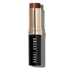 On-the-go cream foundation stick | Bobbi Brown Skin Foundation Stick, Chestnut (W-108/9) - 0.31 oz/9g | After moisturizing skin, lightly glide across forehead, cheeks, nose, and chin. Blend with fingertips, a sponge, or our Foundation Brush (sold separately). Build coverage as desired. | A portable cream foundation stick that glides on weightless medium-to-full coverage that lasts all day. This versatile stick foundation effortlessly evens out your complexion and conceals imperfections with real Brown Skin Foundation, Bobbi Brown Skin Foundation, Foundation Contouring, Moisturizing Foundation, How To Match Foundation, Foundation Stick, Creamy Concealer, Skin Foundation, Stick Foundation