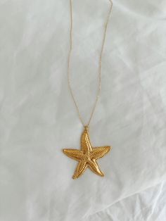 Large gold plated starfish on thing gold filled chain, 18in long Jewelry Care: Avoid Contact with moisture, lotions & perfumes Remove before showering & swimming FINAL SALE: no refunds or exchanges Luxury Elegant Jewelry With Starfish Charm, Cheap Vintage Summer Jewelry, Luxury Ocean-inspired Starfish Jewelry, Cheap Starfish Necklaces For The Beach, Cute Cheap Jewelry For Holidays, Cheap Beachy Starfish Jewelry, Affordable Starfish Jewelry For Beach Season, Cheap Starfish Jewelry For Beach Season, Cheap Starfish Necklaces For Beach