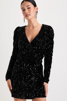 We recommend pairing your sparkly personality with the Lulus Glowing Muse Black Sequin Velvet Long Sleeve Wrap Mini Dress! Dazzling black sequins dance across this velvet dress that features long sleeves with puffy shoulders and a flirty surplice bodice (with a hidden modesty clasp). The flattering wrap silhouette secures with adjustable tying sashes at the side, atop an overlapping skirt that finishes at a sultry mini hem. Fit: This garment fits true to size. Length: Mid-thigh. Size medium measures 33.75" from shoulder to hem. Bust: Great for any cup size. Waist: Fitted - very fitted at natural waist. Hip: Not Fitted - room for hips. Undergarments: May be worn with any standard bra. Fabric: Fabric has some stretch. Lined. Shell: 100% Polyester. Lining: 94% Polyester, 6% Spandex. Hand Wash Wrap Mini Dress, Lulu Fashion, Long Sleeve Wrap Dress, Green Sequins, Mini Wrap Dress, Evening Attire, Dress Size Chart, Black Sequins, Stunning Dresses