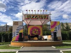 an outdoor stage set up for a jazz concert