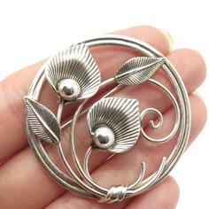 Great antique condition.  925 Sterling Silver Antique Van Dell Lily Floral Leaf Pin Brooch  Weight: 10.9g   WELCOME TO PAWN SHOP We are an actual pawn shop and have been in business for over 25 years. Since 1990, our establishment has been serving a variety of clients by providing them with short term cash solutions and options of liquidity regarding their treasured heirlooms. Acknowledging that today′s customers are very sophisticated and are looking for a variety of investments, our acquisitio Luxury Artisan Silver Brooches, Luxury Modern Sterling Silver Brooches, Affordable Silver Brooch Jewelry, Affordable Handmade Silver Pins, Cheap Handmade Silver Pins, Cheap Elegant Silver Brooches, Silver Brooches Handmade Jewelry, Cheap Classic Silver Brooches, Luxury Handmade Silver Brooch