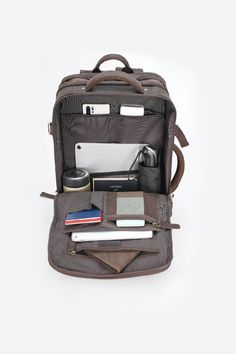 an open laptop bag sitting on top of a white table