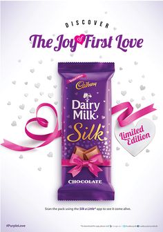 an advertisement for the dairy milk silk chocolate bar with pink ribbon and hearts on it