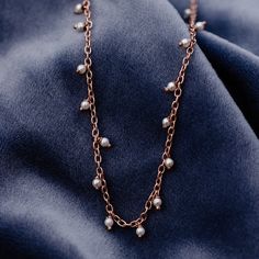 Add some sparkle to your seaside look with the Hanging Pearl Beaded Choker. This super-elegant design features a delicate silver or rose gold chain, accentuated with glimmering pearls to add some sparkle to your style! Silver: Brass base with silver plating & synthetic pearls- Rose Gold: Brass base with rose gold plating & synthetic pearls- Chain: 14" with 3" extention. Jump ring at 1" and 2" of extension.- Pearls: 2mm diameter Pura Vida Necklace, Pearl Rose, Bead Choker, Rose Gold Chain, Pearl Hoop Earrings, Pearl Choker, Gold Brass, Pearl Chain, Womens Glasses