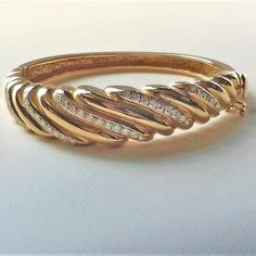 "This is an estate vintage midcentury 14 K Gold \"P\", which means \"Plumb\" (exact 14K-no less and SOLID), (does not mean plated) diamond bangle with 38 round genuine 2mm diamonds 1.14 ctw. The bracelet weighs 40.32 grams and is 6.5 inches inside diameter. This bangle is Soooooooo pretty." Vintage Round Diamond Cut Bracelet, Vintage Diamond Bracelet For Anniversary, Vintage Diamond Accents Bracelet For Formal Occasions, 17 Jewels Bangle Diamond Bracelet For Anniversary, Fine Jewelry Metal Bracelets For Anniversary, Vintage Formal Bracelets With Diamond Accents, Vintage Bracelets With Diamond Accents For Formal Occasions, Fine Jewelry 14k Stamped Bangle, Vintage Diamond Bracelet Jewelry