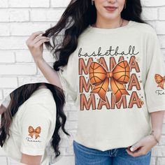 Introducing the Custom Basketball Mama Coquette Doodle Shirt, the perfect way for any sports mom to show off her pride during basketball season! This personalized sleeve print t-shirt is not only stylish but also a great-fitting basketball mom shirt designed for comfort and flair. Whether you're cheering from the bleachers or relaxing at home, this basketball mama tee captures the spirit of game day. It makes an ideal basketball mom gift for Mother's Day or any occasion, allowing you to celebrat Casual Sublimation Custom Print Design For Basketball, Sporty Graphic Print T-shirt For Mother's Day, Casual Basketball T-shirt With Letter Print, Casual Sublimation Print Top For Mother's Day, Mother's Day Casual Tops With Sublimation Print, White Letter Print Basketball T-shirt, White Basketball T-shirt With Letter Print, White Letter Print T-shirt For Basketball, White T-shirt With Letter Print For Basketball