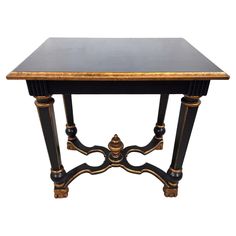 a black table with gold trimmings on the top and bottom, against a white background