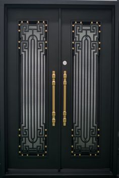 a black and gold double door with two sidelights on the top, and one side