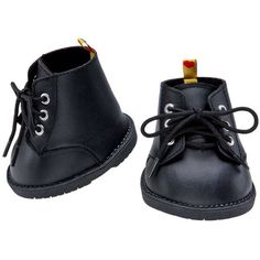 a pair of black shoes with laces on them