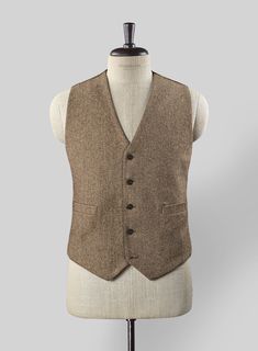 The Irish Brown Herringbone Tweed Waist Coat will become the standard of business dressing and by far the most ubiquitous option. Crafted from wool, the Irish Brown color of the waist coat will surely influence a veteran dresser to buy the waist coat for building a sharp wardrobe.    Look Includes    Irish     Brown     Herringbone     Tweed  Fabric  Classic Vest    Click 'Customize Now' to modify the look if needed.  
  Lining: Viscose; Dry Clean. Elegant Brown Tweed Jacket With Herringbone Pattern, Brown Tweed Suit With Herringbone Pattern, Brown Tweed Outerwear With Herringbone Pattern, Brown Tweed Long Coat, Brown Double-breasted Tweed Jacket For Tailoring, Master Tailor, Tweed Waistcoat, Italian Suit, Herringbone Tweed