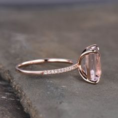 Natural Morganite and cubic zircon ring in 925 sterling silver. This ring set is marked 925. Main stone is 9x7mm emerald cut, band stone is cz. I accept custom making order.Please contact me if you need this service. For all the jewelries,there is a 14 days money back guarantee.You can return it in the time frame without any questions.However there maybe handcrafted fee and shipping fee deducted from the original payment as it is handmade. Morganite Ring With Prong Setting For Formal Occasions, Morganite Topaz Ring With Accent Stones For Promise, Formal Morganite Rings With Prong Setting, Formal Morganite Ring With Prong Setting, Formal Morganite Solitaire Ring, Morganite Solitaire Diamond Ring For Anniversary, Morganite Diamond Promise Ring, Anniversary Rings With Morganite And Prong Setting, Morganite Rings With Prong Setting For Anniversary