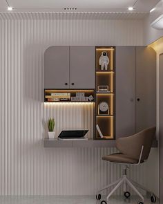 a room with a chair, desk and bookshelf on the wall next to it