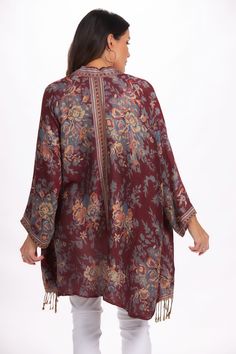 Just in time for the cooler weather! You will love the bold pattern of this printed kimono. Comfortable and cozy - right on trend this season. The tassel detail along hemline is the perfect touch. 55% Acrylic, 45% Viscose Machine Wash Cold, Hang to Dry Model is wearing the One Sized top. Model measurements: 5'9", 145lbs, 38 / 31 / 42 London Chic, Printed Kimono, Cooler Weather, Merlot, Just In Time, Top Model, Model Measurements, In Time, London