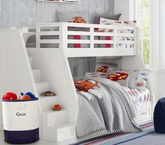 a child's bedroom with bunk beds and toys on the floor in front of it