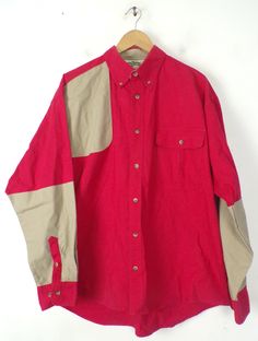 "-Description- >red & brown color block men's shirt by Bob Allen >button front >collared >button close pocket on the front >size XL >so retro! >condition: great >color(s): red, brown >fabric(s): cotton >brand: bob allen >care: machine wash -Measurements- >size: XL ✩ all measurements are taken with the item laying flat & some sizes are estimates so please check measurements ✩ chest: 54\" / 137cm length: 29\" / 74cm shoulder to sleeve end: 24\" /61 cm sh Red Long Sleeve Patchwork Shirt, Red Long Sleeve Top For Outdoor, Red Patchwork Shirt For Fall, Fall Red Patchwork Shirt, Red Patchwork Button-up Tops, Red Cotton Tops For Outdoor, Retro Red Tops With Pockets, Casual Red Shirt For Outdoors, Casual Red Shirt For Outdoor