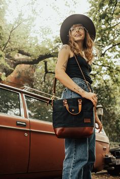 Pictured in our black weather resistant waxed canvas and chestnut leather. A bag that feels familiar. Designed to be that perfect size, not too big, not too small. More structure and fit. Four interior and four exterior pockets keep things organized. Bags Aesthetic, Western Movies, Womens Tote, Womens Tote Bags, Documentaries