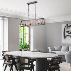 a dining room table with chairs around it