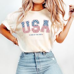 Are you looking for a trendy 4th of July shirt? This beautiful Comfort Colors t-shirt, with a retro USA design, is meant to make you feel proud every time you will wear this tee, on fourth of July and beyond. If you know someone who would love to wear a red white blue patriotic shirt for Independence Day, this trendy tee would make a great gift for them.  Check out more unique and funny designs in our shop, including more America themed clothes: https://www.etsy.com/shop/AllTheHappyDesigns/ PROD Merica Shirt, Usa Design, Create Picture, Fourth Of July Shirts, Patriotic Shirt, 4th Of July Shirt, Patriotic Shirts, Blue Tee, Trendy Tee