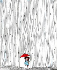 a child with an umbrella is walking in the rain on a rainy day, while it's raining