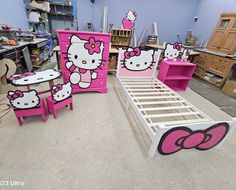 a bedroom with hello kitty furniture in it