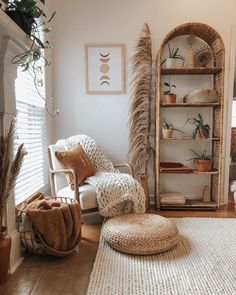 a living room filled with furniture and plants