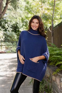 Experience the ultimate blend of warmth and style with our CozyCove Turtle Neck Poncho. This luxurious poncho features a snug turtle neck and easy-to-use arm openings, allowing you to move with ease while staying cozy. Perfect for both casual and chic looks, embrace comfort and fashion in one effortless piece. #lovemyleto 100% Polyester Imported Cozy Soft Knit Outerwear With Funnel Neck, Cozy Soft Knit Funnel Neck Outerwear, Cozy Winter Cape With Batwing Sleeves, Cozy Funnel Neck Outerwear, Cozy Poncho For Cold Weather, Cozy Winter Cape Poncho, Cozy Winter Poncho For Cold Weather, Cozy Cape For Cold Weather And Fall, Cozy Cape For Cold Weather In Fall