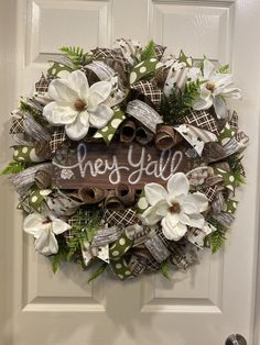 a wreath that says hey y'all on it