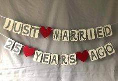 just married and 25 years ago banner with hearts