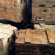 several wooden boxes stacked on top of each other