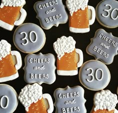 decorated cookies with beer and beers on them for 30th birthday party or anniversary cake topper