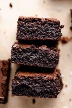 four pieces of brownie sitting on top of each other