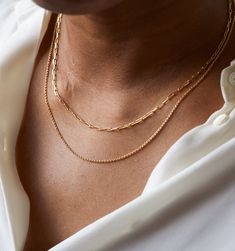 This dainty gold chain is a perfect delicate necklace to layer or wear alone. Made to stack, layer, and wear everyday.  Also available in sterling silver. Classic Everyday Charm Necklaces In 14k Gold Filled, Everyday Minimalist Cable Chain Necklace, Minimalist Everyday Cable Chain Necklace, Dainty Sterling Silver Chain Necklace For Everyday, Sterling Silver Necklaces With Adjustable Chain For Layering, Sterling Silver Necklace With Adjustable Chain For Layering, Simple Everyday Cable Chain Necklace, Delicate Sterling Silver Chain Necklace For Everyday, Simple Everyday Paperclip Chain Jewelry