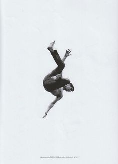 a man flying through the air while riding a skateboard in front of a white background