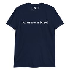 Our "lol ur not a bagel" T-Shirt is soft, comfortable, and made just for you. It's a funny bagel t-shirt with a sarcastic saying, expertly printed on the front. Looking for something personalized? Shoot us an email! * 100% ring-spun cotton * Dark Heather is 65% polyester, 35% cotton * Pre-shrunk * Unisex fit * Actual color may be slightly different from the image due to different monitor and light effects. This t-shirt has a unisex fit. See size guide for sizing info. If unsure, size up! Funny Graphic Tees, T Shirts With Sayings, Sarcastic Quotes, Shirts With Sayings, Graphic Tees, Gender Neutral, Tops & Tees, Adult Outfits, T-shirt