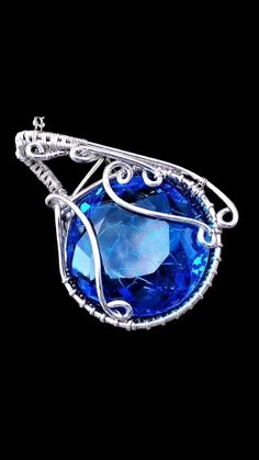 DISCOUNTED Huge Sterling Silver Faceted Blue Topaz Glass Elven Crystal Mystical Fantasy Amulet Gemstone Wire Wrapped Pendant Necklace ❤️ FREE SAME DAY SHIPPING ❤️ https://www.etsy.com/listing/1051182919/discounted-huge-sterling-silver-faceted?click_key=55fa3947e1098808b3647f2de63ceffd335532fb%3A1051182919&click_sum=1a650289&ref=shop_home_active_70&pro=1&frs=1&sts=1 #arcalchemistone #blue #faceted #carribbean #glass #sterlingsilver #pendant #amulet #necklace #etsy #handmade #wirewrappedjewelry Fantasy Amulet, Fantasy Wire, Wire Wrapped Gemstones Pendant, Amulet Necklace, Gemstone Necklace Pendant, Wire Wrapped Pendant, Wire Wrapped Jewelry, Gemstone Pendant, Blue Topaz