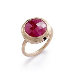 A chunky and sophisticated ring from bezel-set fair trade natural ruby and Oregon black jasper inlay in 14k gold. Designed and made in our Portland studio. Most rubies on the market have been heat treated to remove their crystal inclusions and to alter the color by allowing more light to pass through. We're using untreated rubies in these rings. While traditional treated rubies are beautiful, we think the inclusions and color variations found in these natural rubies retains a uniqueness and a co Luxury Ruby Ring With Round Stone, Timeless Polished Ruby Ring, Timeless Ruby Ring With Center Stone, Fine Jewelry Ruby Ring With Polished Finish, Timeless Round Ruby Ring, Ruby Birthstone Ring With Polished Finish, Elegant Faceted Round Ruby Ring, Elegant Faceted Ruby Ring, Yellow Gold Ruby Gemstones