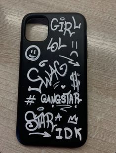 an iphone case with graffiti written on it