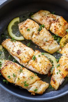 chicken with lemon and herbs in a skillet