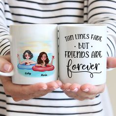 two women holding coffee mugs that say i love you to the beach and back