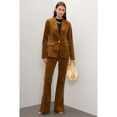 Brown corduroy (97% Cotton, 3% Elastane). Blazer. Long sleeves. Collar. Front button closure. 26.5" from shoulder to hemline. Imported. Velvet Blazer For Work In Fall, Velvet Blazer For Workwear In Fall, Velvet Blazer For Fall Workwear, Elegant Single Breasted Corduroy Outerwear, Elegant Single-breasted Corduroy Outerwear, Elegant Corduroy Outerwear For Work, Formal Corduroy Outerwear For Fall, Brown Corduroy Blazer For Work, Corduroy Button-up Blazer For Workwear